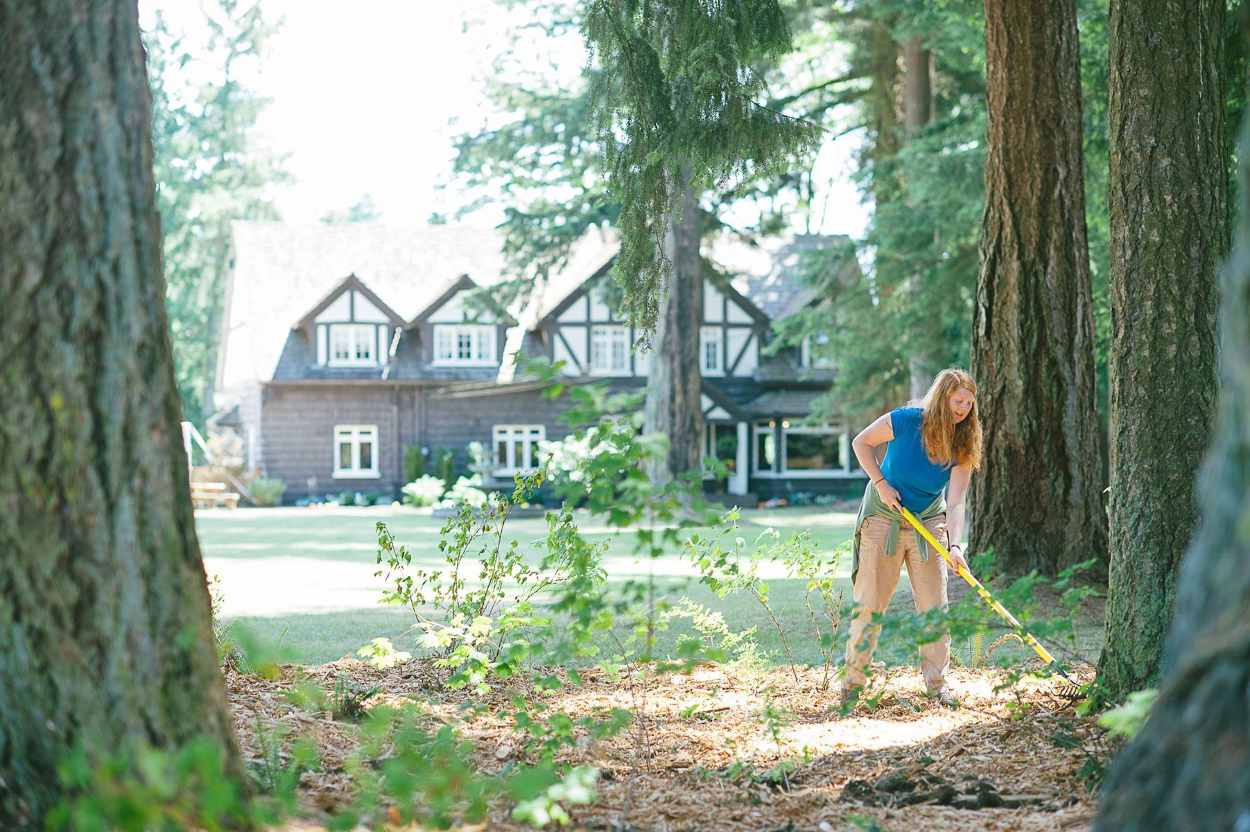 An A Rocha intern creates a native plant garden at Brooksdale.