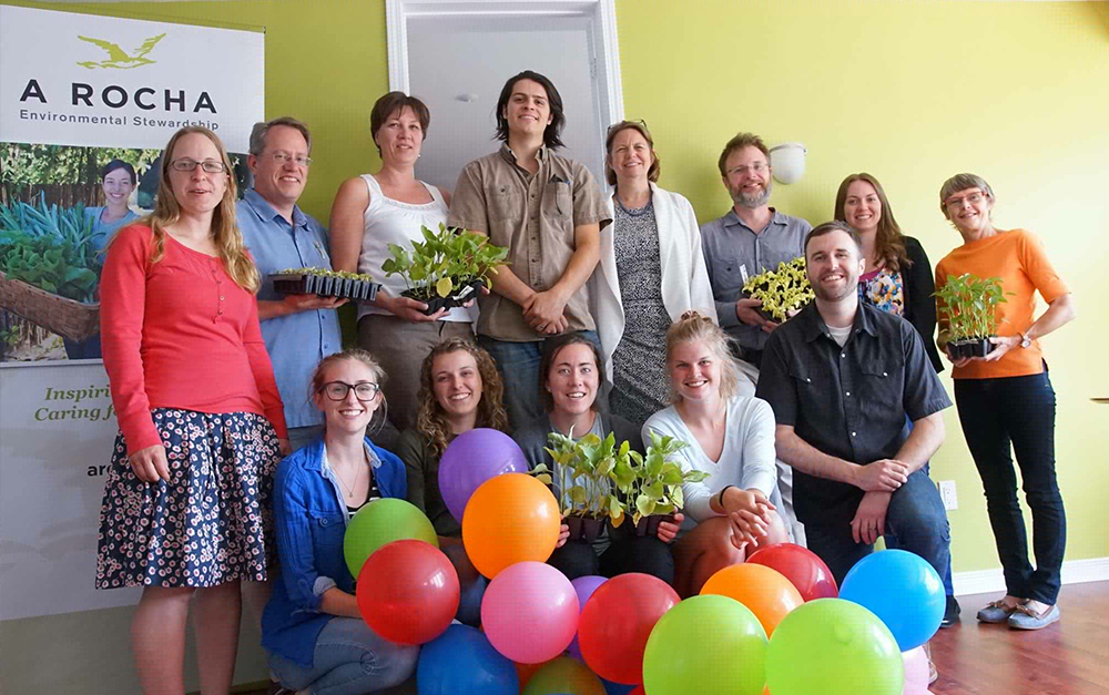 Ontario Team with Plants and Balloons