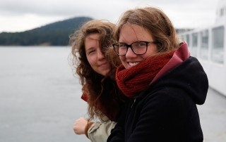 Two Interns Smile at Coast