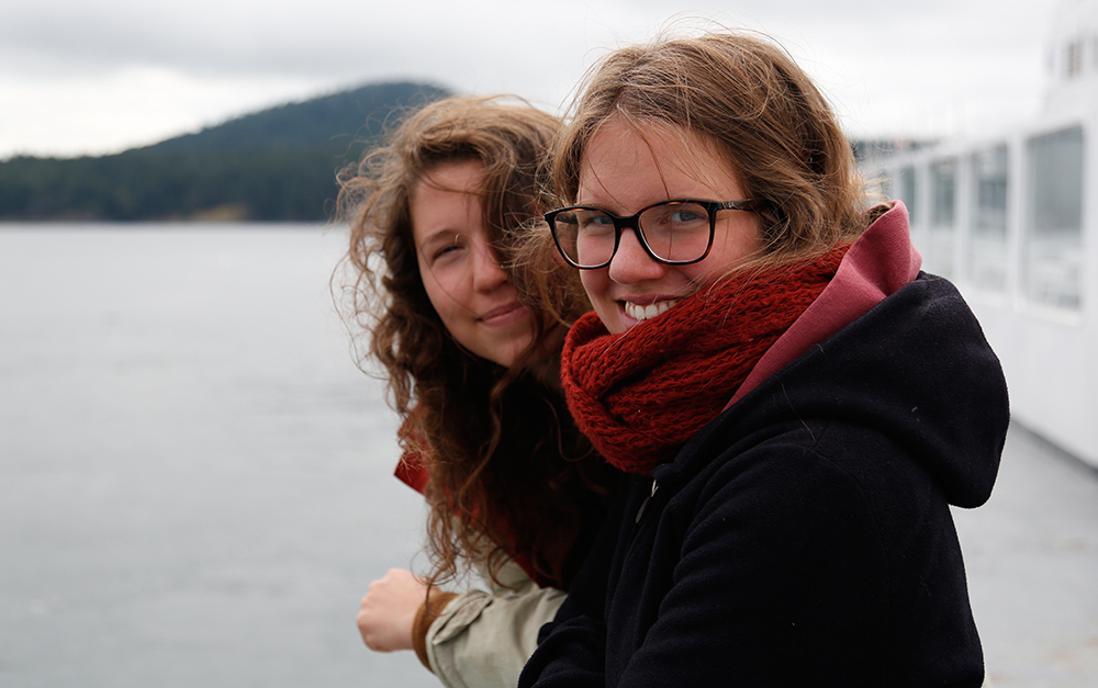 Two Interns Smile at Coast