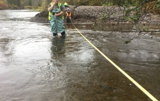 Volunteer Measures Water in Upper Bulkley River