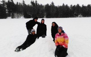 Young Adults Playing in the Snow