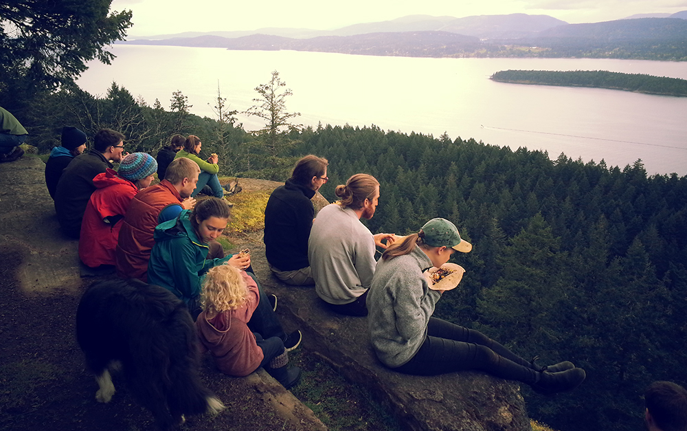 Interns Eating Together on Cliff