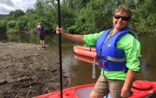 Margaret Letkeman during a river kayaking spawner survey