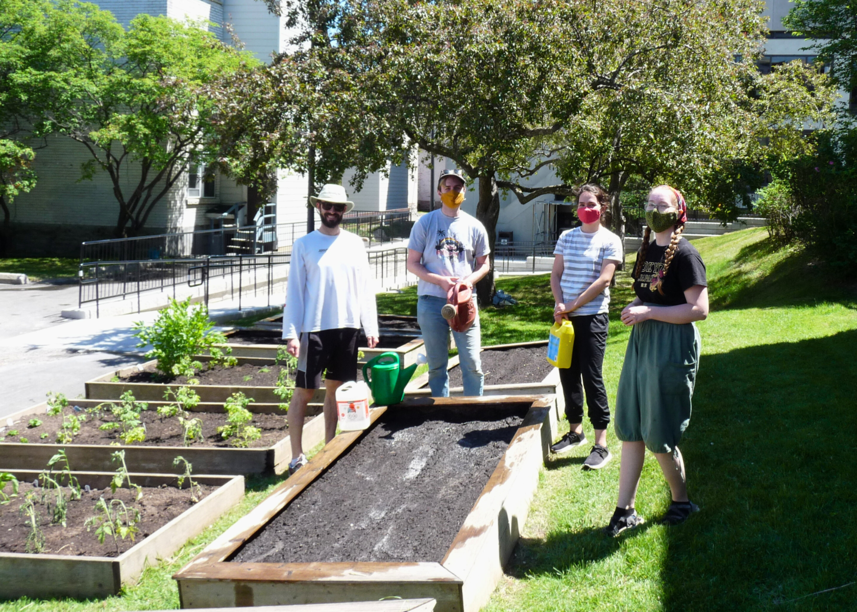 Supporters of A Rocha Ottawa gardening.