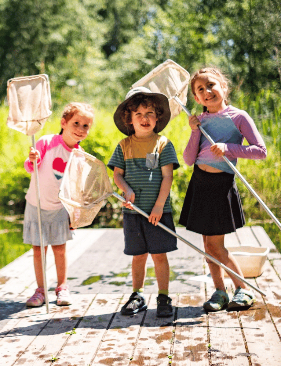 Kids with fishing nets at A Rocha