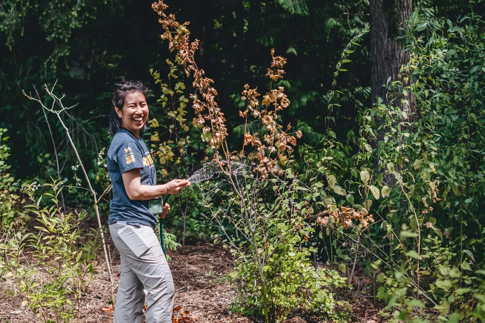 A Rocha Volunteer helping restore nature